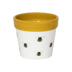 A lovely ceramic plant pot with a yellow rim, white base colour and a cheerful bumble bee pattern that is sure to be adored.