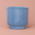 Blue Berlin Ripple Pot with horizontal ridges and a cylindrical shape