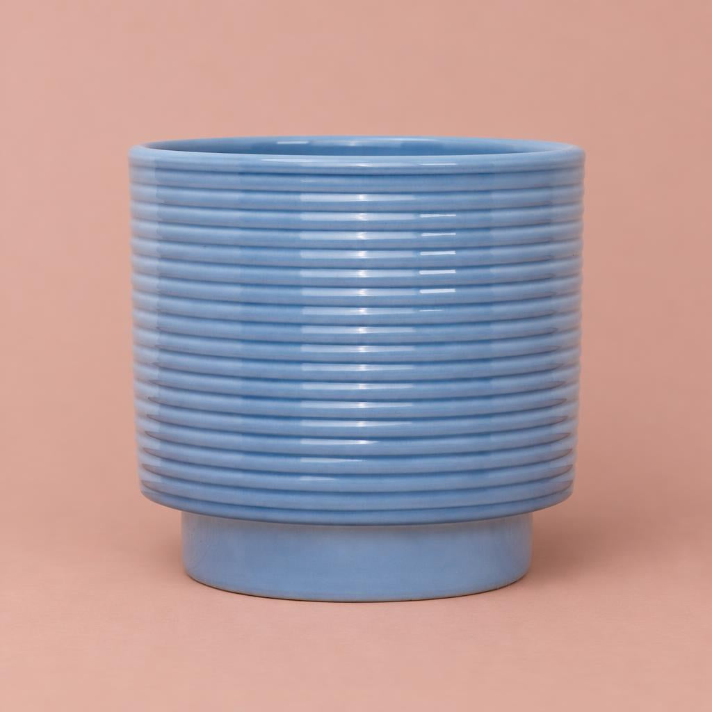 Blue Berlin Ripple Pot with horizontal ridges and a cylindrical shape