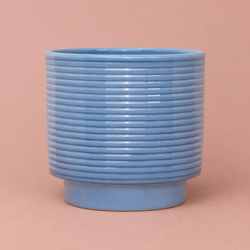 Blue Berlin Ripple Pot with horizontal ridges and a cylindrical shape