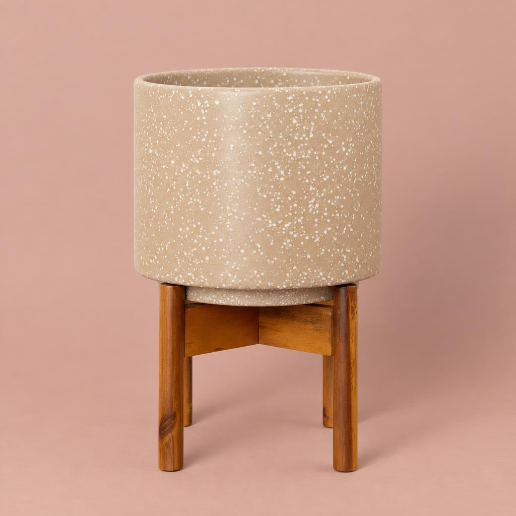 Valetta Speckled Caramel pot with a cream-speckled finish and light brown wooden stand