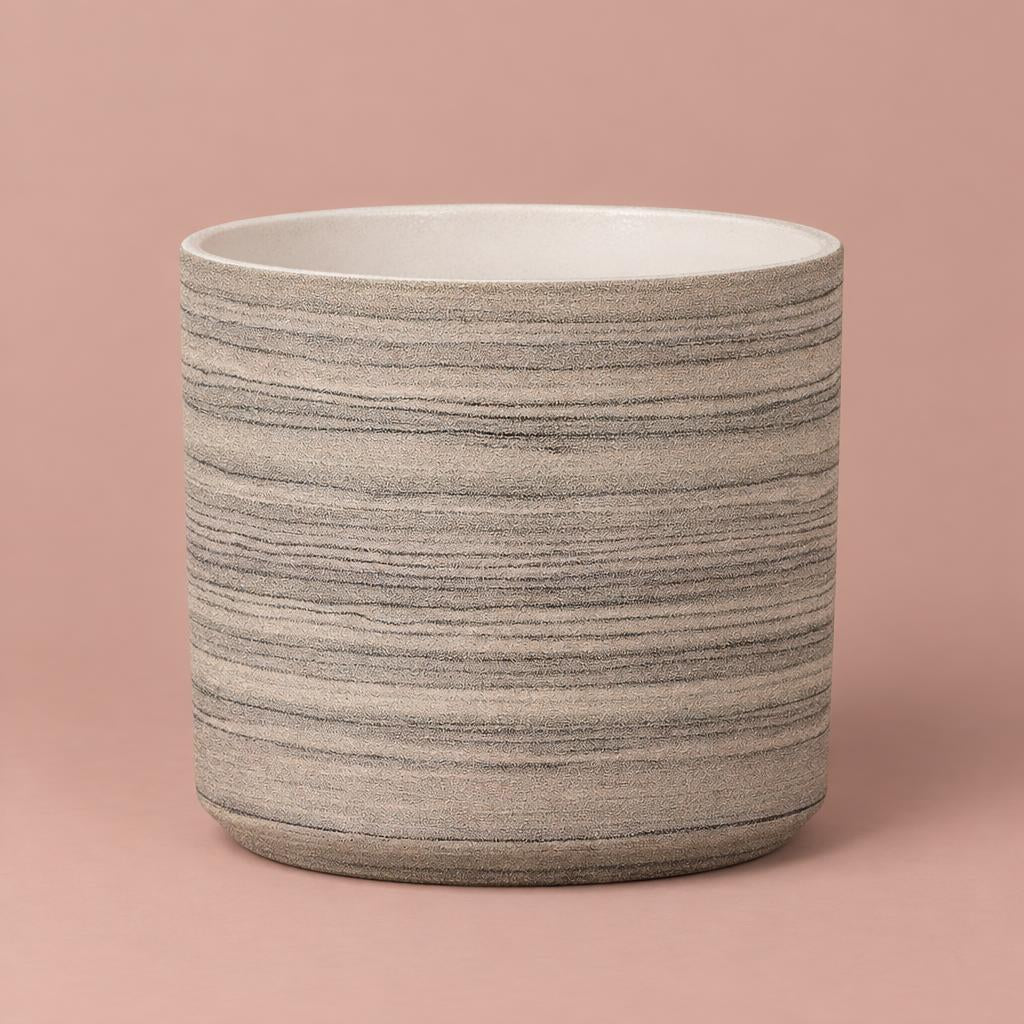 Mondo Raw Timber pot with pale beige and brown bark-inspired markings and a rounded base