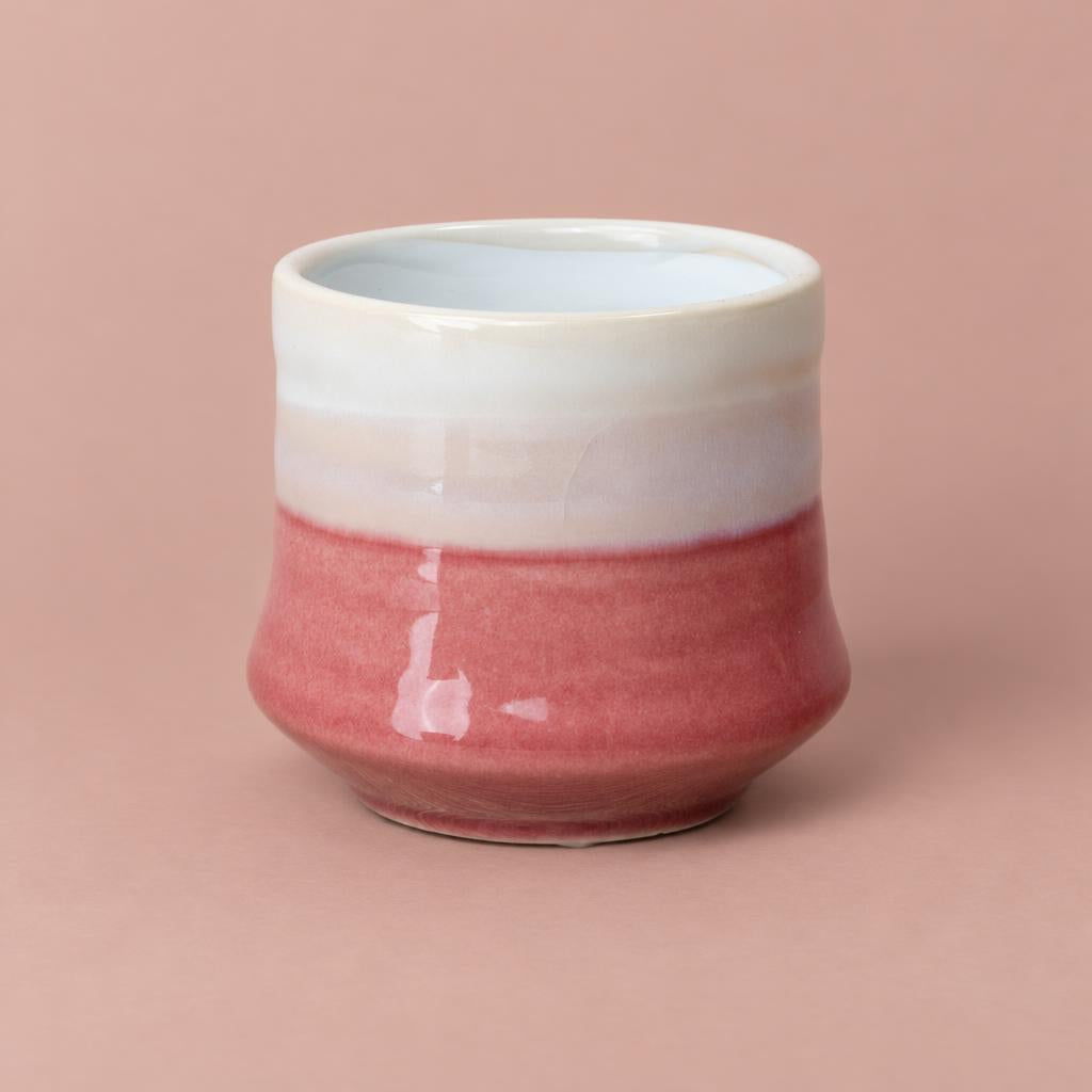 Stuart Little pink and cream ceramic pot with a sculpted base