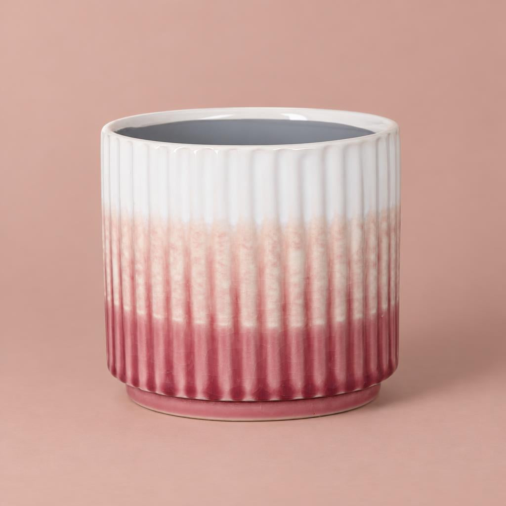 Pink Kiri Pot with vertical ribbing and a glossy glaze fading from white at the rim to berry-pink at the base