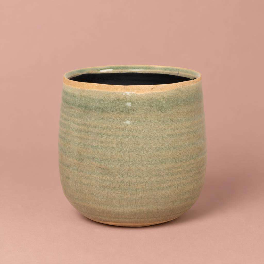 Como plant pot in mint with a cracked earth-style pattern