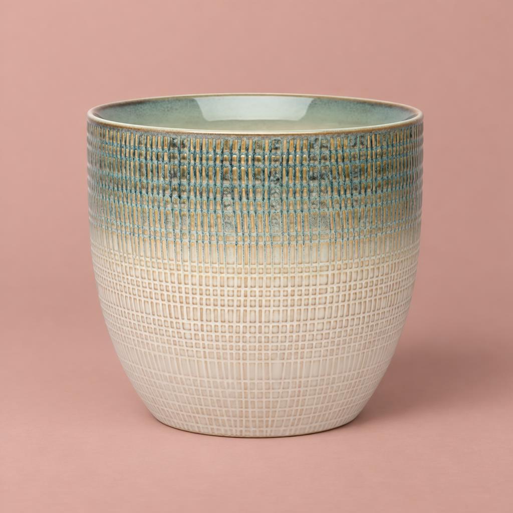 Blue Nina plant pot with a softly rounded shape