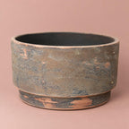 Romy brown bowl-shaped plant pot with a low, wide profile