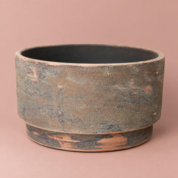 Romy brown bowl-shaped plant pot with a low, wide profile