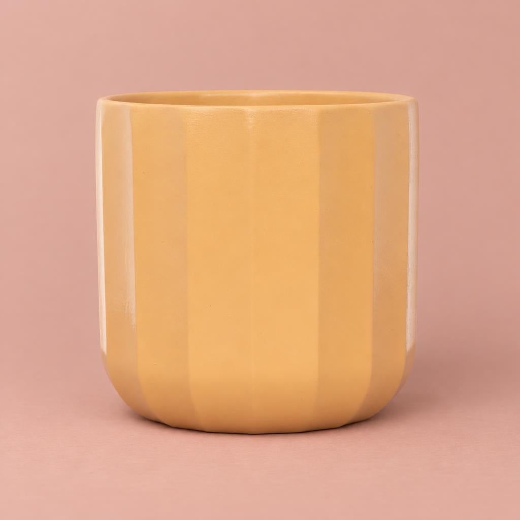 Apricot Positano plant pot with a geometric design