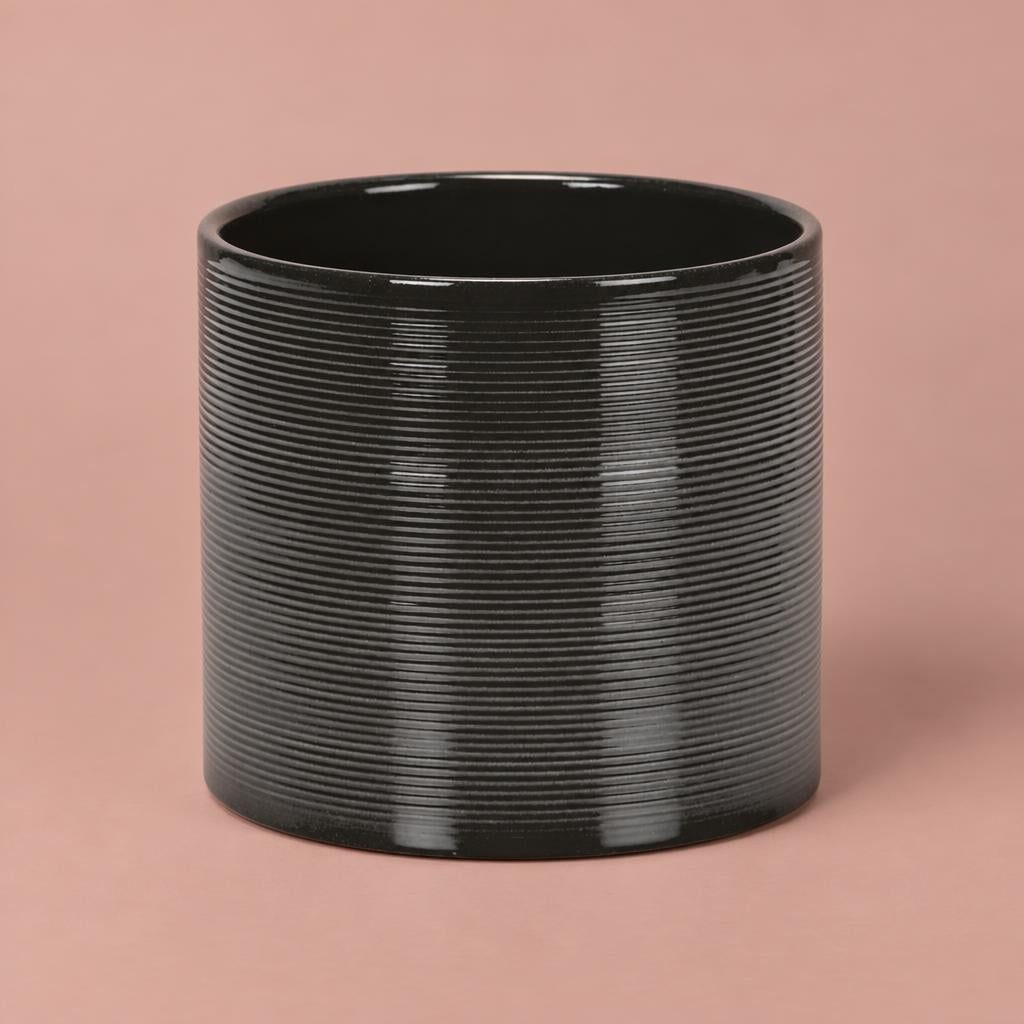 Glass Grey ceramic plant pot with horizontal ribs and a rounded shape