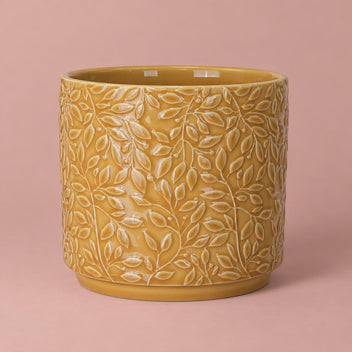 Yellow Arbor ceramic pot with a glossy glaze and embossed trailing-leaf pattern
