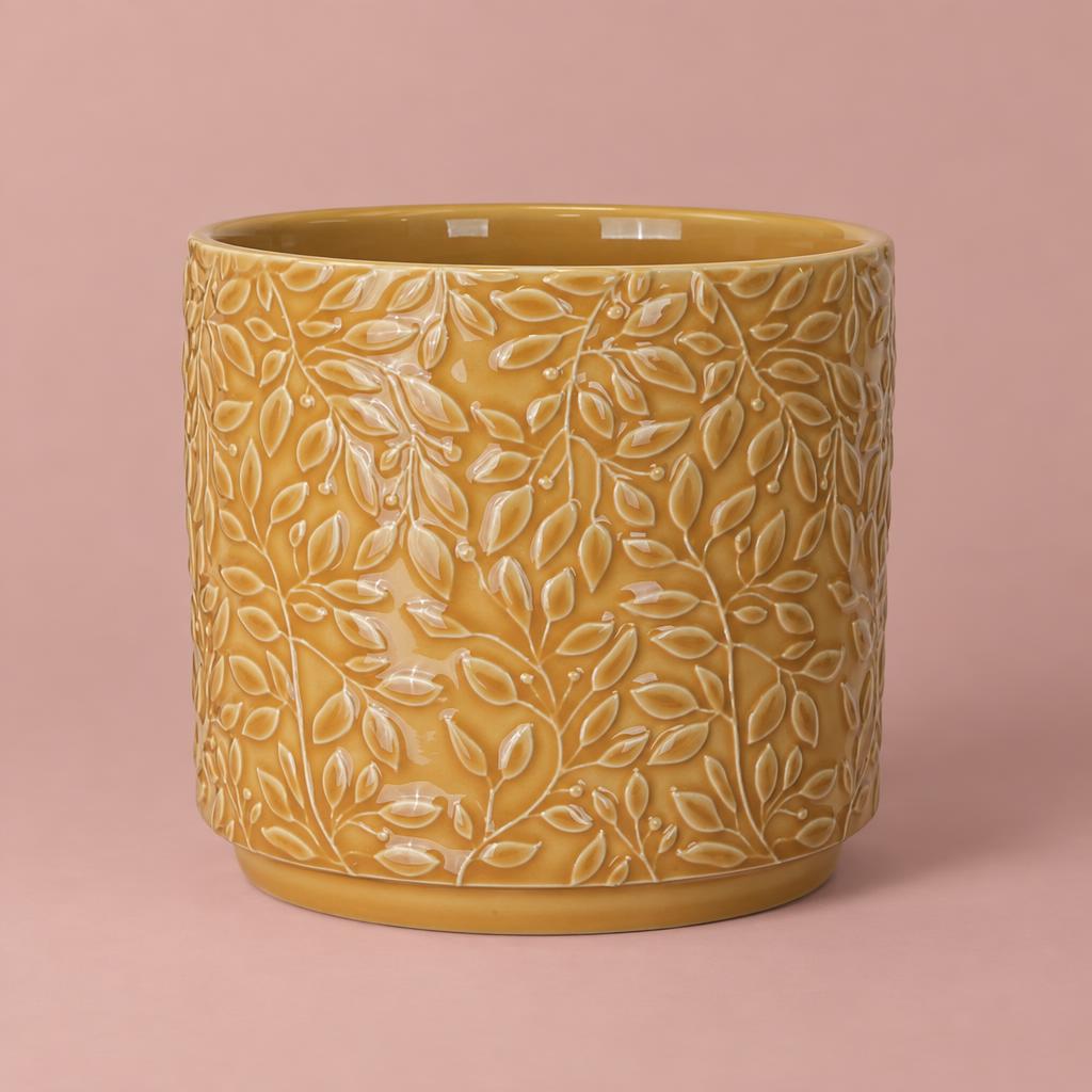 Yellow Arbor ceramic pot with a glossy glaze and embossed trailing-leaf pattern