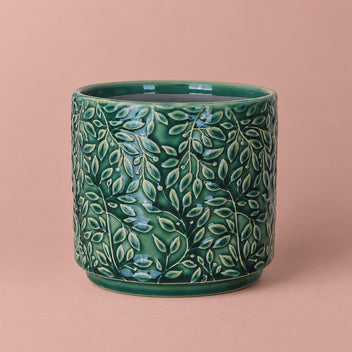 Green Arbor pot with a glossy finish and embossed trailing-leaf pattern