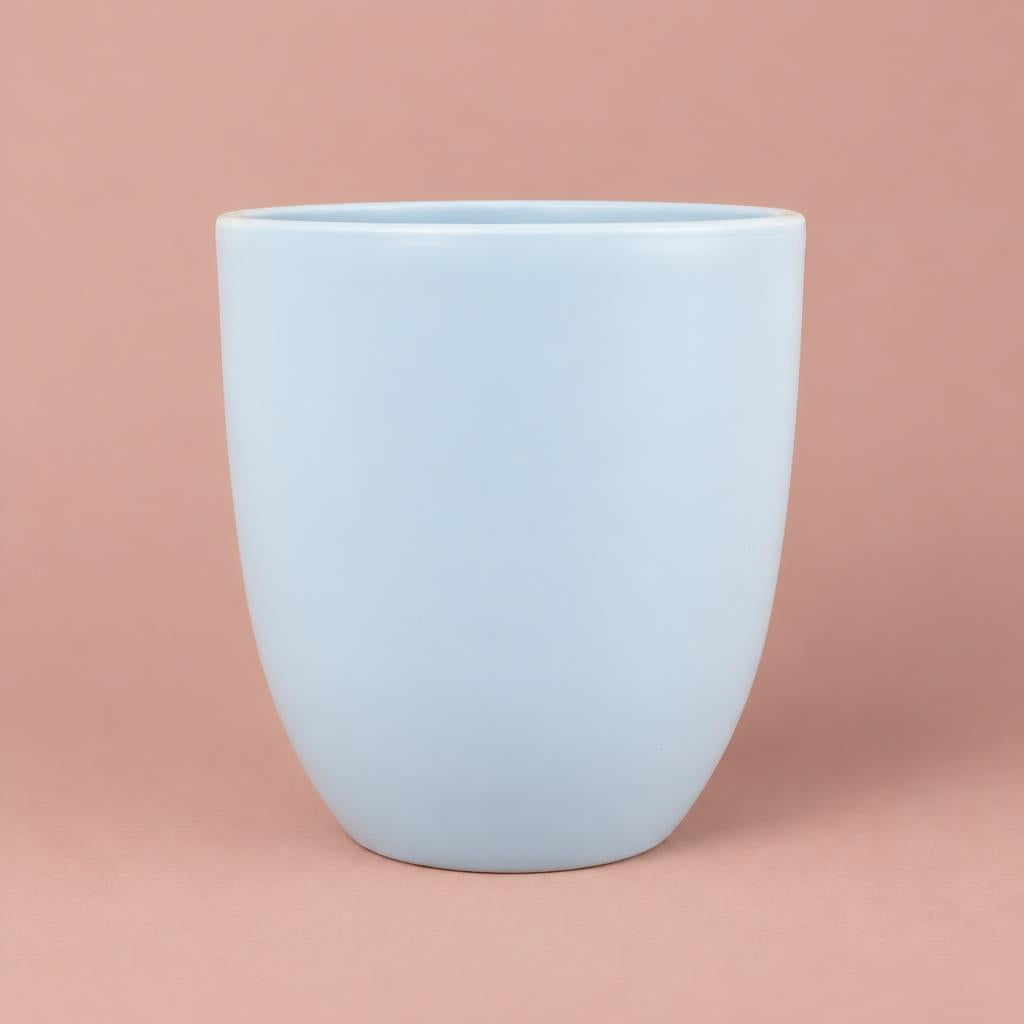 Hugo light blue pot with a tall, rounded shape