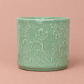 Betsy mint plant pot with embossed floral decoration