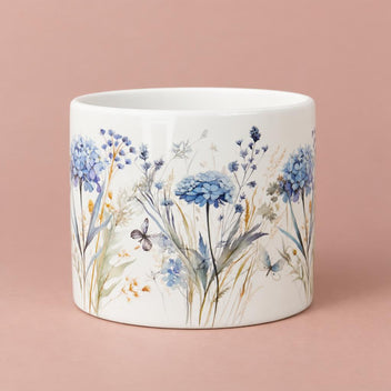 Floral Fiori ceramic pot with a glossy white background and blue hydrangea, foliage and butterfly decoration
