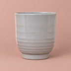 Sofia Grey Granite plant pot with a rounded, vase-like shape