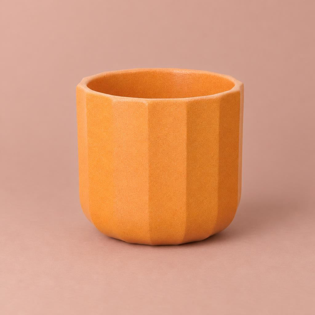 Orange Positano plant pot with a geometric design