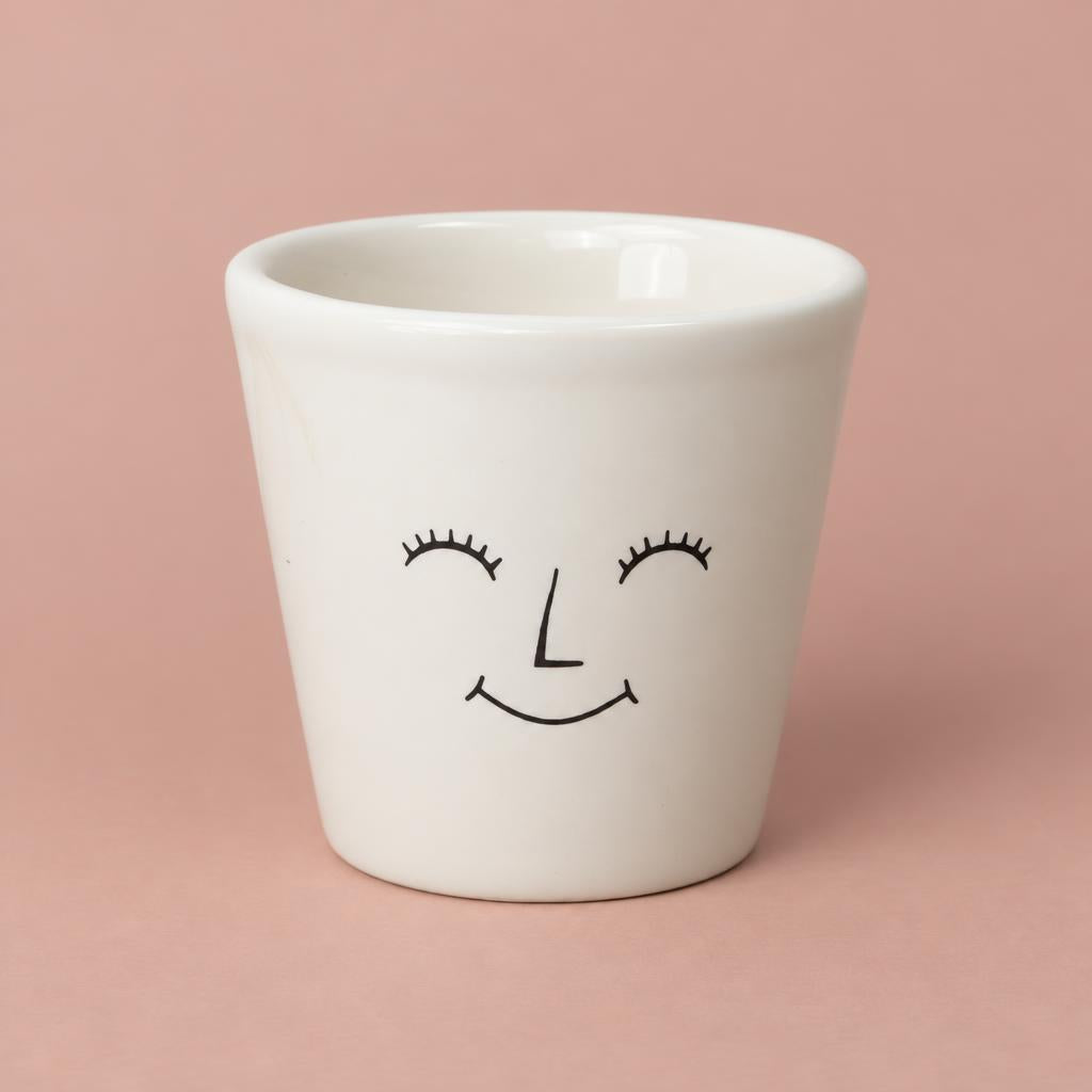 White Happy Face pot with a minimalist face design