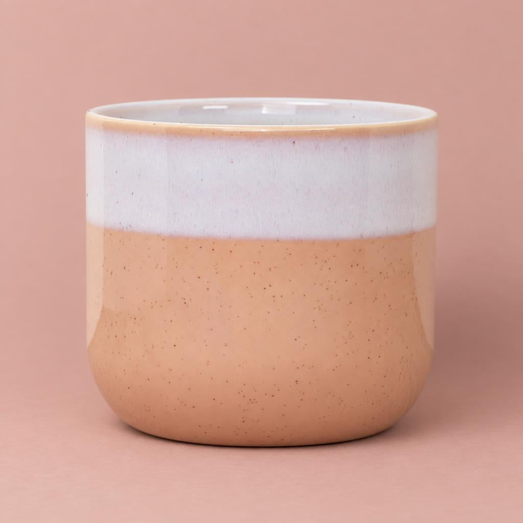 Jodie Reactive Dipped pink ceramic pot with a creamy white top