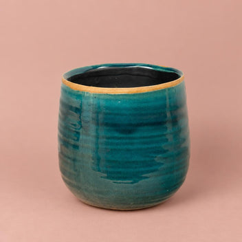 Como turquoise plant pot with cracked earth-inspired pattern