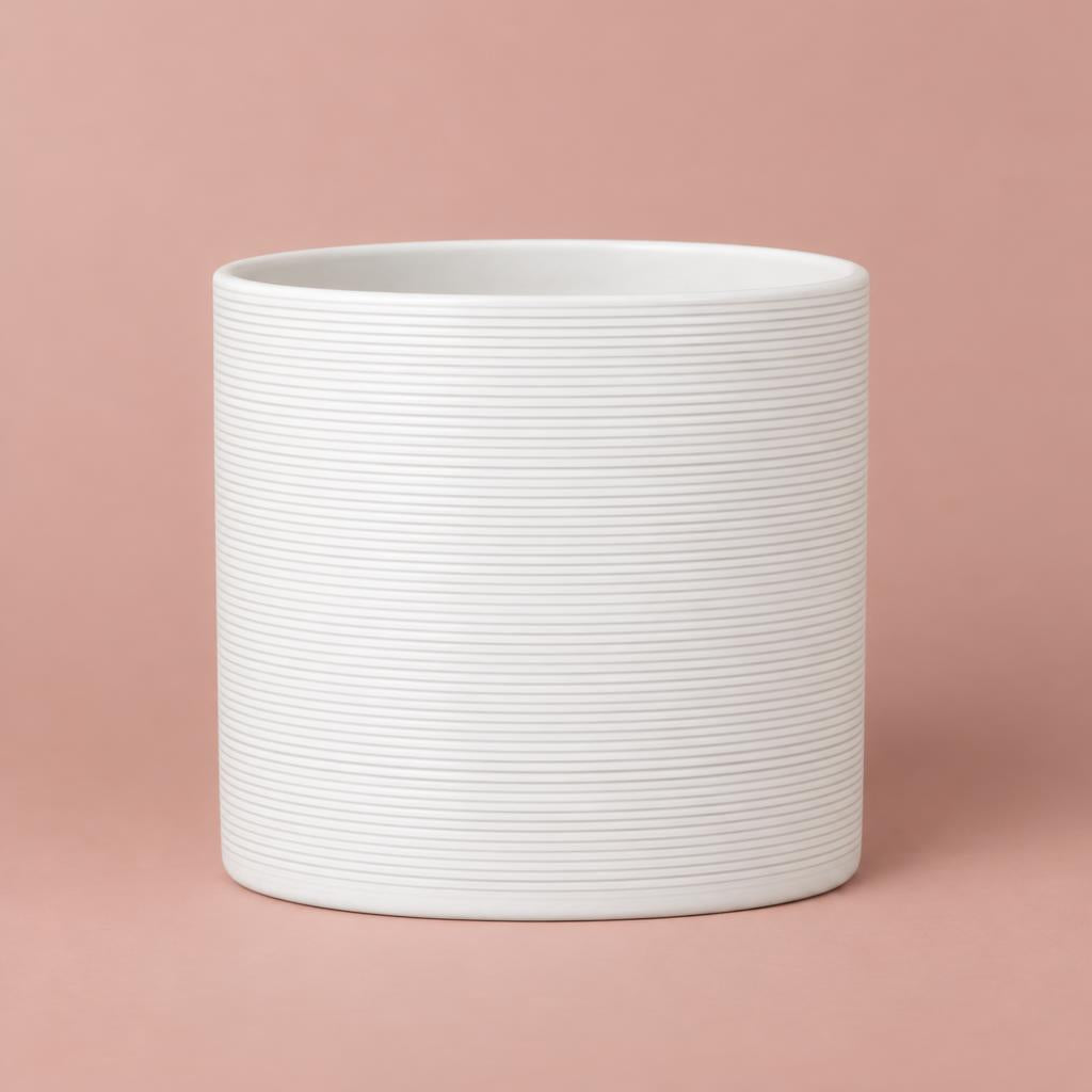Panna ceramic pot with fine horizontal ribbing and a rounded shape