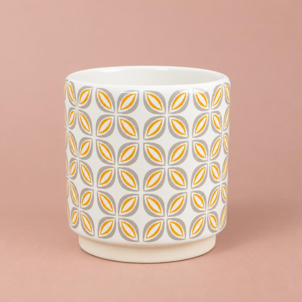 Retro Geometric pot with mustard yellow oval patterns, grey surrounds and a white background