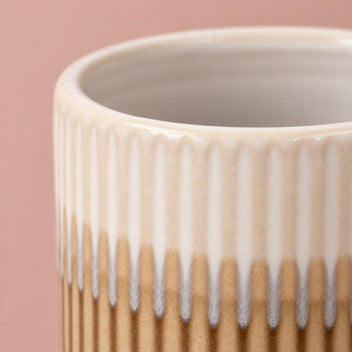 Brown and cream Dinky Dave ceramic pot with a ribbed surface