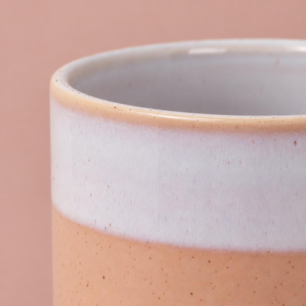 Rounded Jodie pot with a blush-pink base and two-tone reactive glaze