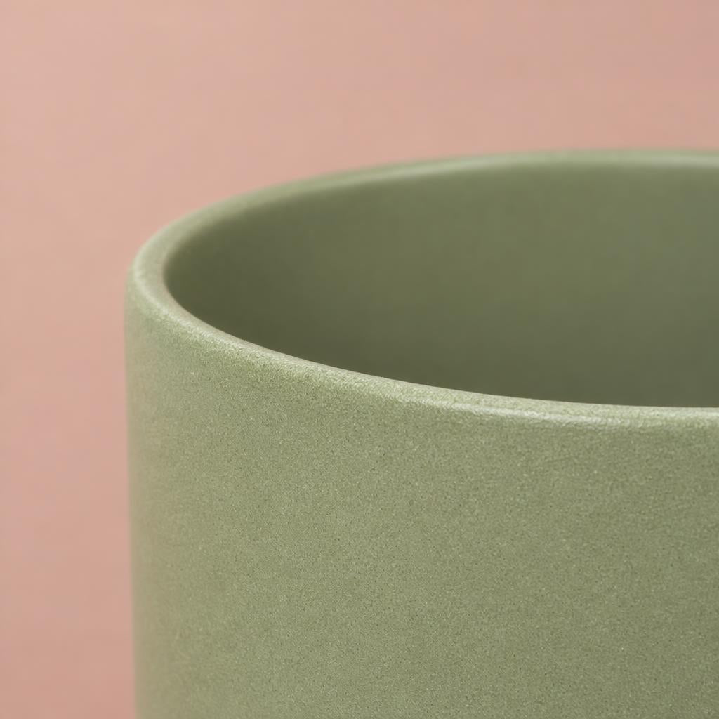 Single Sage Green Lisbon ceramic plant pot with a curved shape
