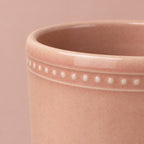 Dotted Pink Clover plant pot with decorative detail beneath the rim