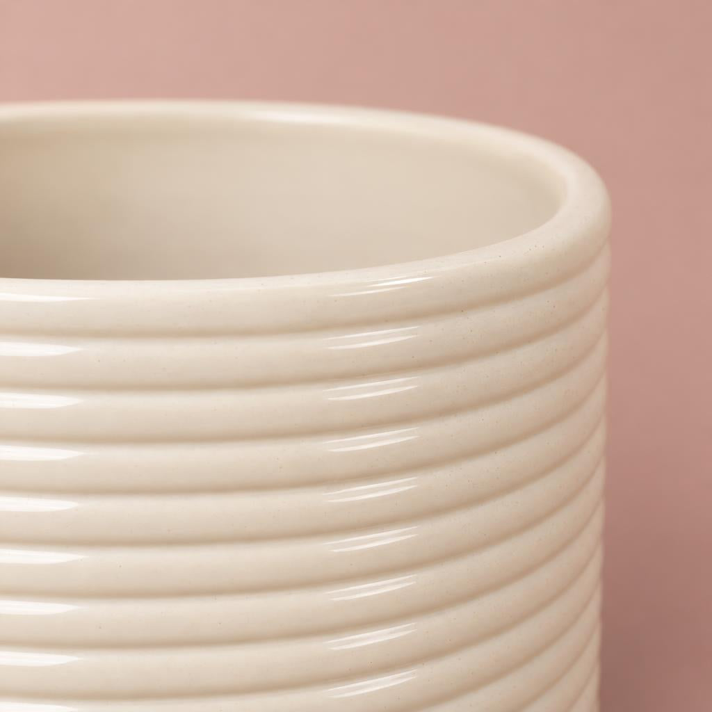 Cream glazed ceramic Berlin Ripple Pot with a rounded shape