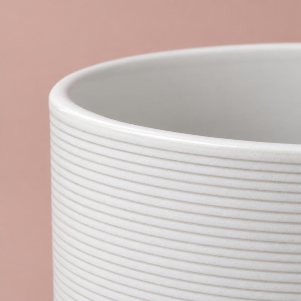 Glossy creamy-white Panna pot with horizontal ribbed detail