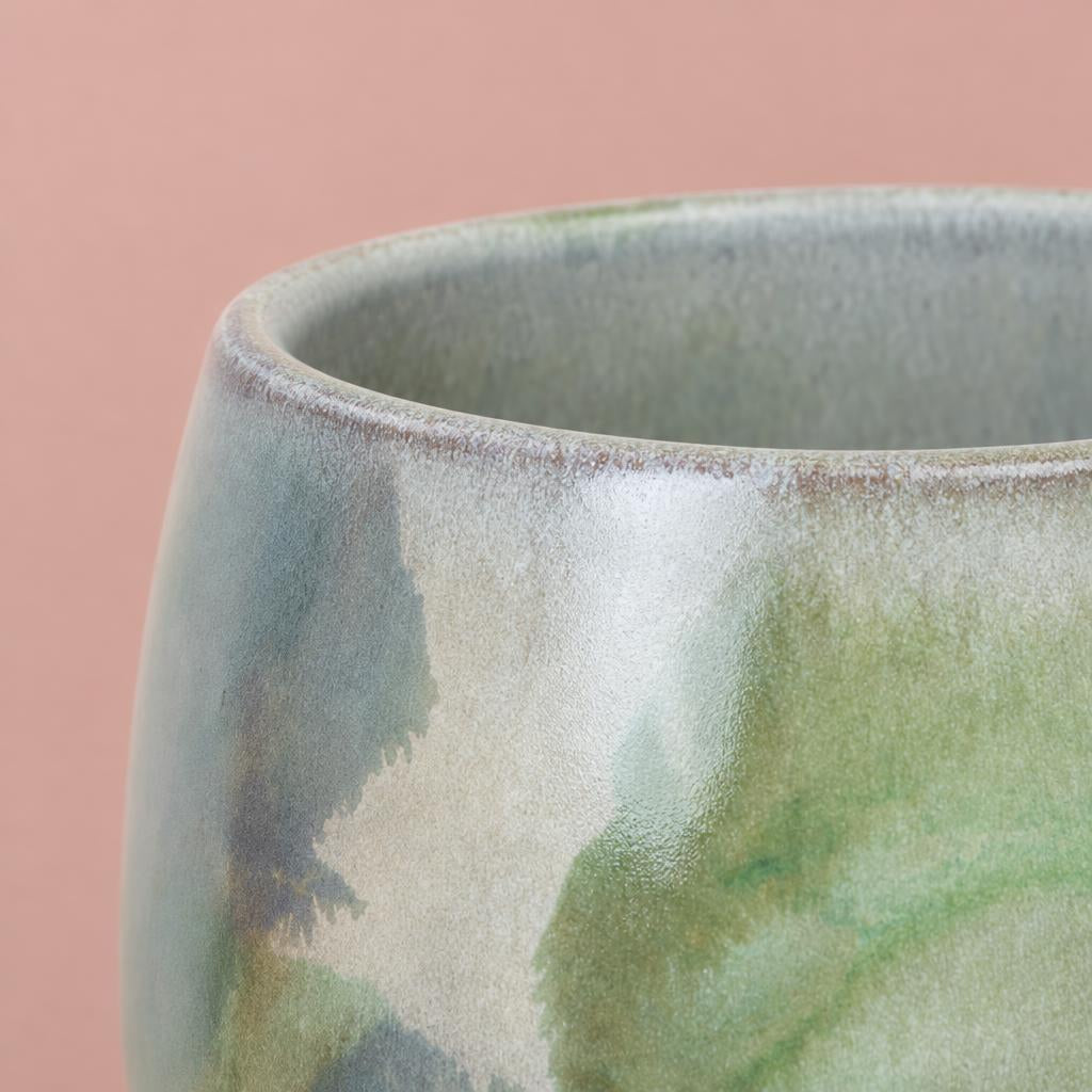Rounded green Lola Abstract Watercolour pot with a painterly glazed finish