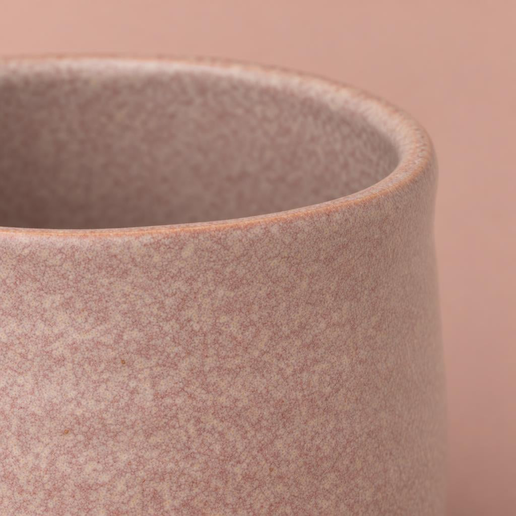 Rounded Celeste pot with a matte pink reactive glaze