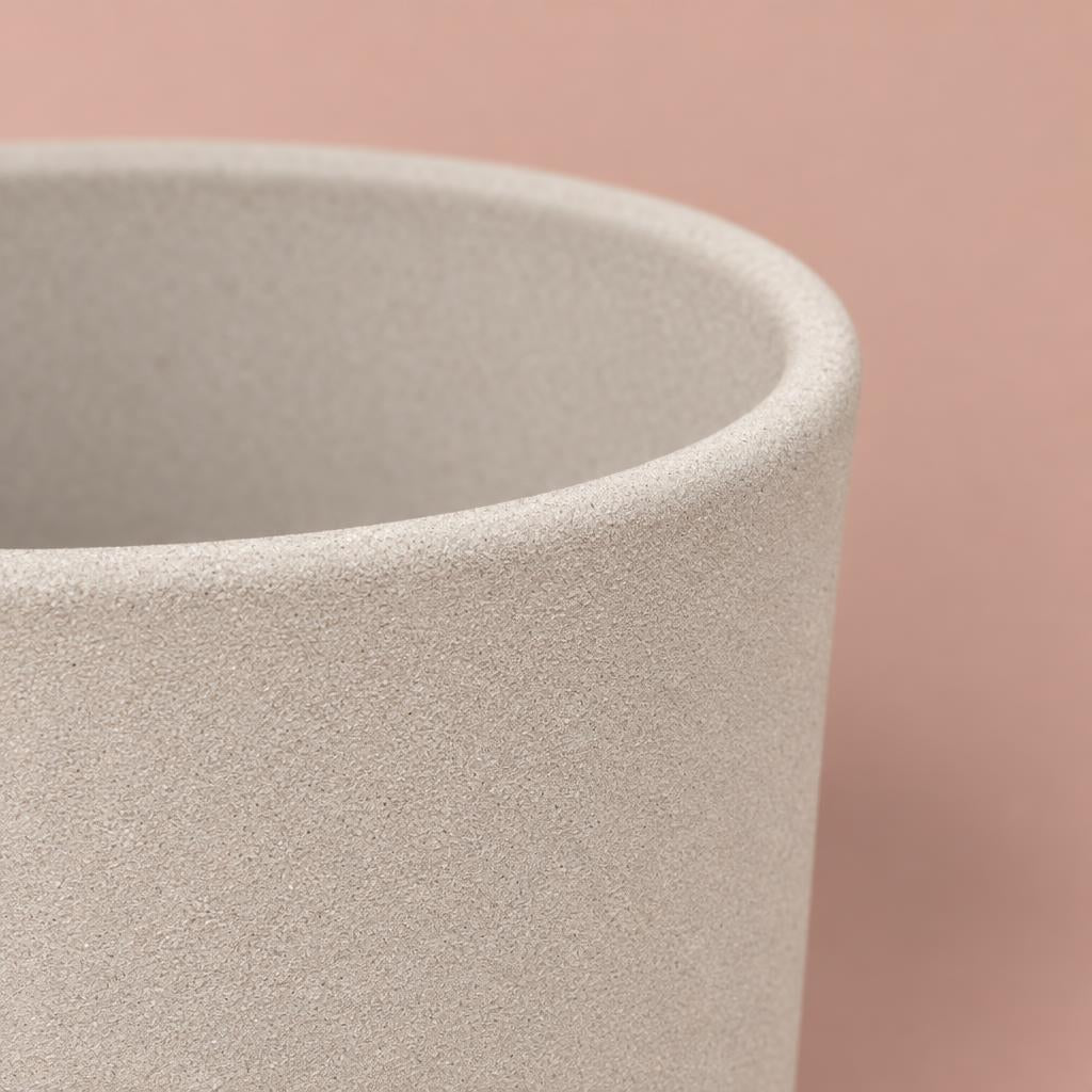 Leon plant pot with light-to-mid grey tones and patterned detailing